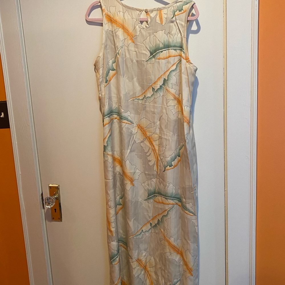 Tommy Bahama Summer breezy 100% silk sheath, palm print, one button closure.